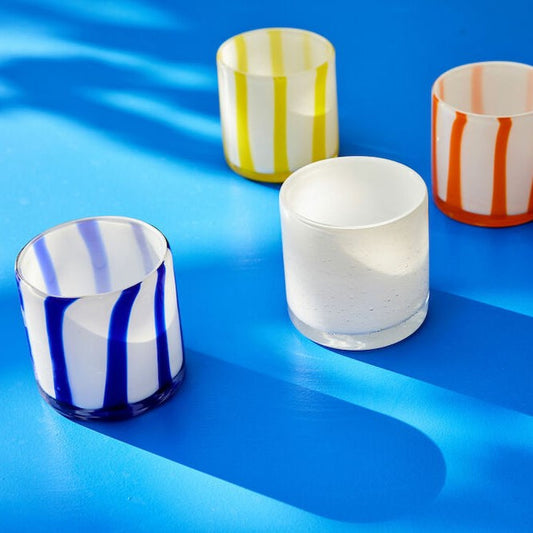 Handmade glass votives in organic shapes with fantastic curves in contrasting colours by Byon