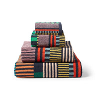 Multicoloured striped bath towels made from 100% Cotton by Donna Wilson