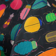 Dark Beetle pattern tea towel made from 100% cotton by Maggie Magoo Designs