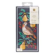 Talking Tables paper napkins in a dark navy blue box decorated with a watercolor-style bird, pears, and red berries, with a white hanging tab at the top.