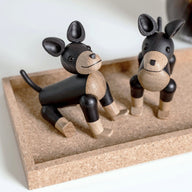 Wooden Charlie The Dogs handcrafted from black stained Oak by Kristian Jakobsen for novoform